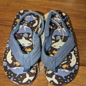 Brand new Cat & Jack shark flip flop sandals.